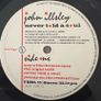 John Illsley - Never Told a Soul. Solo album by the Dire Straits bass player. Cover has the exact same photo as the Walk of Life single that would be released more than a decade later by Dire Straits and Mark Knopfler contributes to this album. Image 4