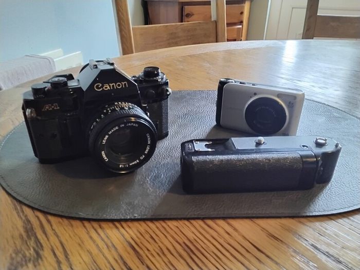 canon A-1 with 50mm lens & winder, also canon power shot A3000 both for spairs/ repair