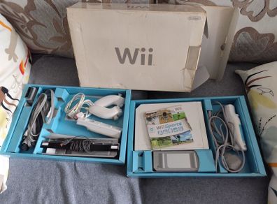 Boxed Wii, 2 controllers and Wii Sports