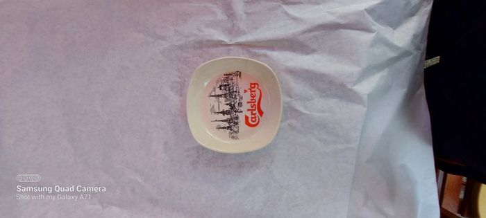 carslberg ashtray,,good condition,,pitting on glaze,,overall good, thank you, collectors item, handy for man cave, home bar etc, if buyer collects cheaper .take as is .