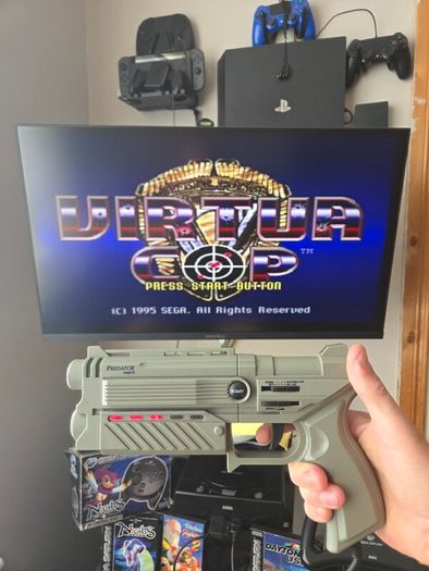 Sega Saturn w/ 3D Control Pad, Arcade Racer, Lightgun and Games