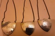 three decanter labels