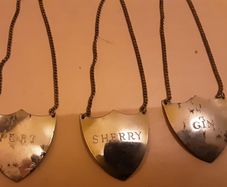 three decanter labels