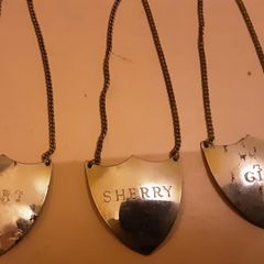 three decanter labels