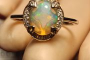 Ethiopian Welo Opal and Lab Grown Diamond Oval Cluster Ring.