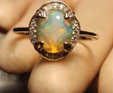 Ethiopian Welo Opal and Lab Grown Diamond Oval Cluster Ring.