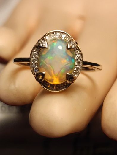 Ethiopian Welo Opal and Lab Grown Diamond Oval Cluster Ring.