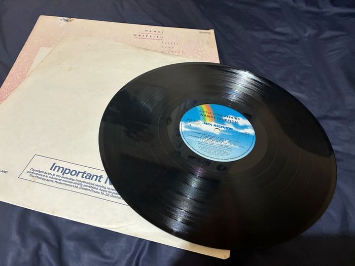 A Nanci Griffith record collection.
