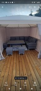 outdoor table and chairs . Gazebo available.