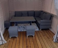 outdoor table and chairs . Gazebo available.