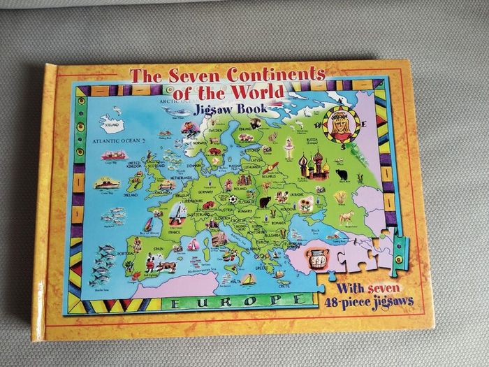 Seven continents of the world educational jigsaw book