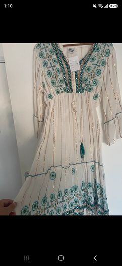 Stunning maxi dress  one size fits all .  new with tags  beautiful  on