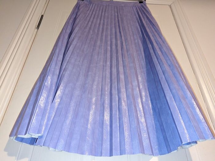 purple/lilac faux leather pleated midi skirt from River Island