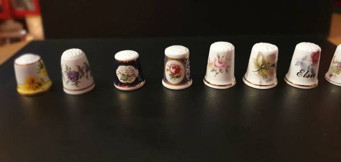 Collection of Flower Themed Gold Coloured Edged Thimbles