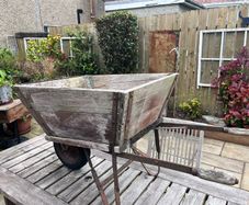 antique wheel barrow