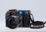 Mamiya 7II Body and F4 65mm lens.