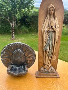vintage holy water font and statue