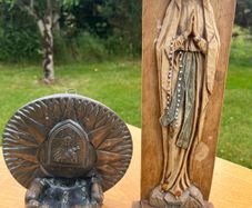 vintage holy water font and statue