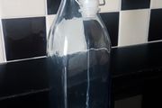 Glass bottle with cup new