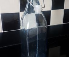 Glass bottle with cup new