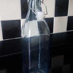 Glass bottle with cup new