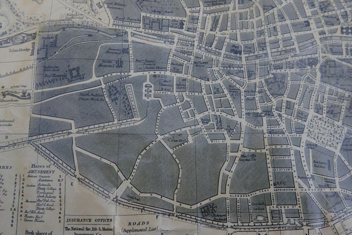 Antique DUBLIN. Map of Dublin & Suburbs with 22 vignettes of Dublin landmarks. Published by Edward Heffernan, 1st June, 1868, 12 Charleville Road, Rathmines. 28" x 22,5". Linen backed. Frayed at edges