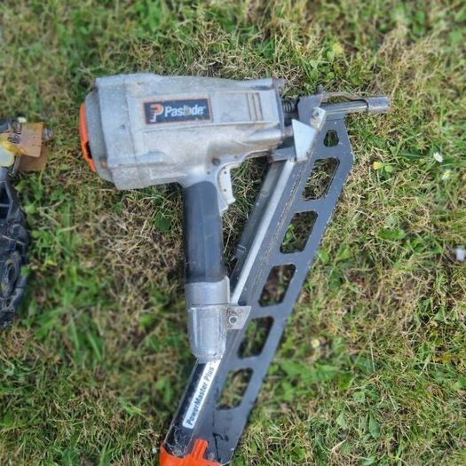 nail guns and 2 hose reels