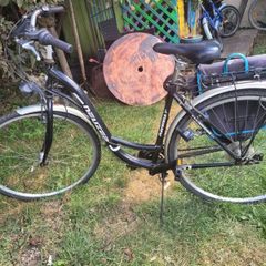 ladies bike with carrier bags and lock