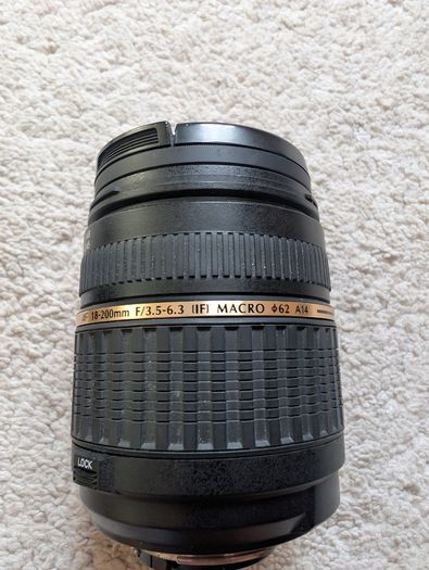 Nikon D7000 DSLR + Nikon 50mm f/1.8G + Tamron 18-200mm + Tripod + Camera Bag