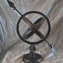 Metal globe and arrow. Image 3