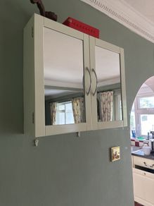 White mirrored bathroom cabinet