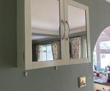 White mirrored bathroom cabinet