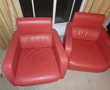 Two Italian leather armchairs