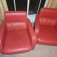 Two Italian leather armchairs