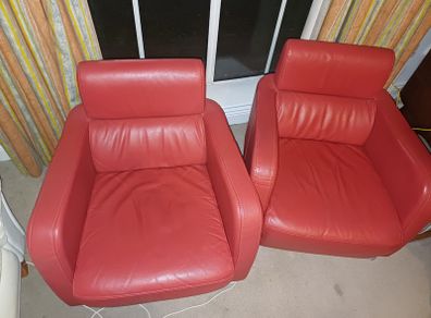 Two Italian leather armchairs