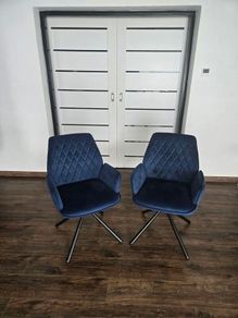 Swivel velvet armchair