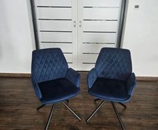 Swivel velvet armchair