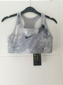 New Nike Reverse top size L (12-13 years)