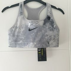New Nike Reverse top size L (12-13 years)