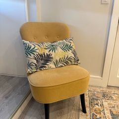 Soft yellow lounge chair from ikea
