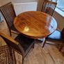 Round wooden table and four chairs Image 8