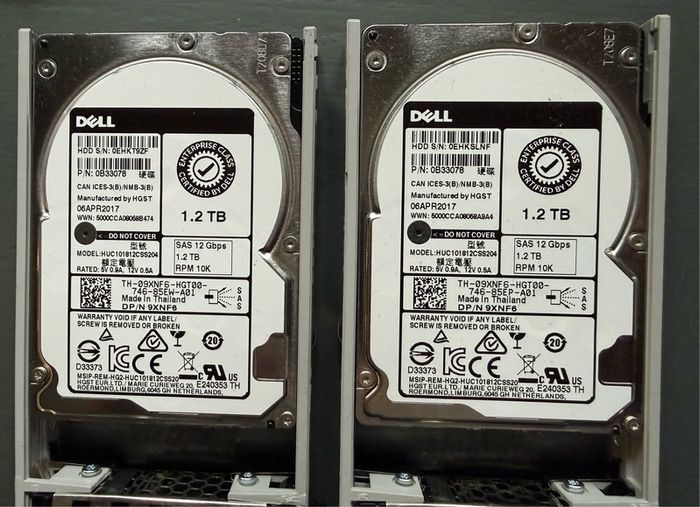 Lot of 4 Dell 1.2TB 10k SAS 12Gbps 2.5" Hard Drives in 3.5" Caddies
