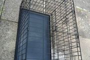 large dog cage with added wheels