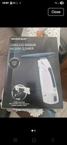 cordless vacuum window cleaner