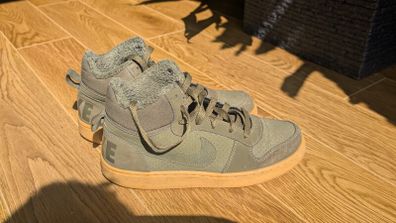 Nike green boots