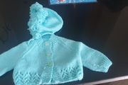 Hand knit baby cardigan and bonnet