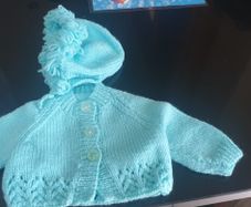 Hand knit baby cardigan and bonnet