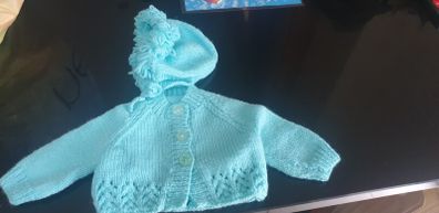 Hand knit baby cardigan and bonnet