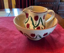 Nicholas Mosse Red lawn set of two , 4 inch jug and a 6 inch diameter bowl . Both have blemishes but perfect for  display