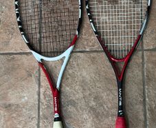 Two squash racquets